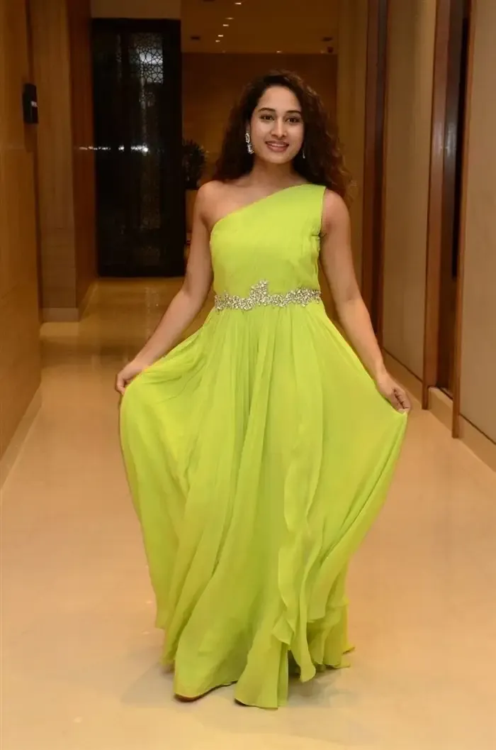 Indian Actress Pooja Ramachandran Images in Long Green Gown